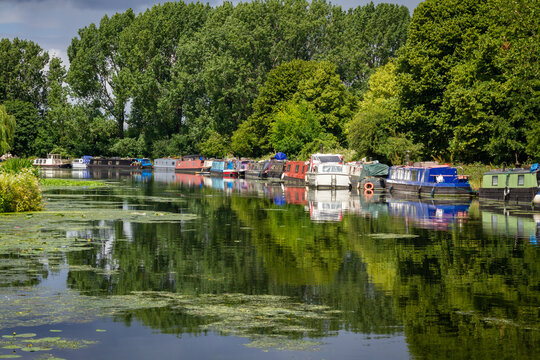 London, Hackney, UK, 5th June 2020: Moored  boats along the river Lee