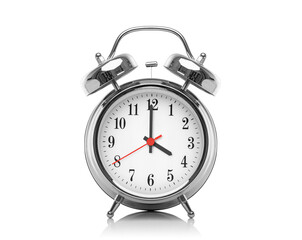 Alarm clock isolated on white background. Four hours after midnight or noon. Sixteen hours on the clock.