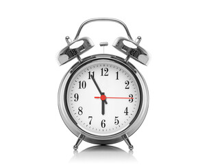 Alarm clock isolated on white background. Six hours after midnight or noon. Eighteen hours on the...