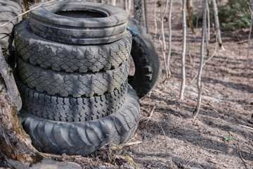 Pile of old rubber tires wating to be recycled. Tire recycling, or rubber recycling, is the process of recycling waste tires that are no longer suitable for use on vehicles due to wear or irreparable