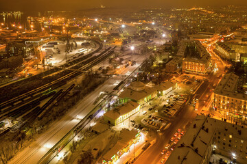 Aerial view of the town and Main railway station on polar night. Murmansk, Russia.
