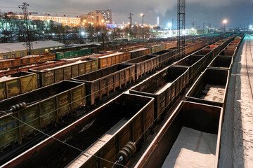 Fototapeta premium View of empty freight cars on polar night. Murmansk, Russia.