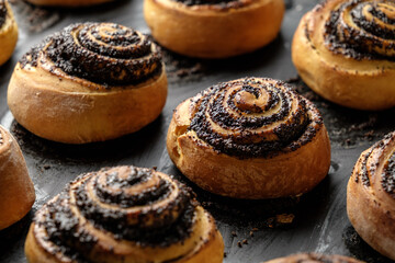 homemade buns with poppy seeds and coffee