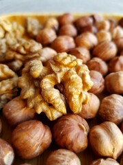 Walnuts and hazelnuts on a plate