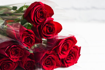 Red roses bouquet white background.