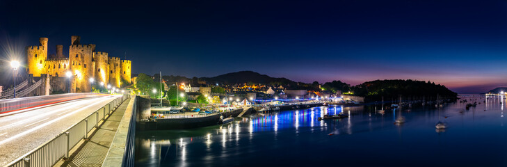 Conwy, Wales - Panorama of Conwy Castle and harbour by night