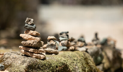 small stone towers in the mountains
