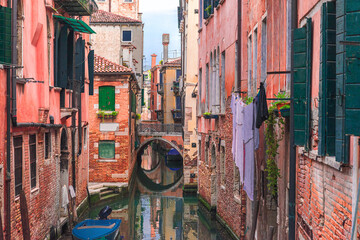 Beautiful view of old town of Venice with colorful buildings, channel and bridge. Venezia, Veneto, Italy.