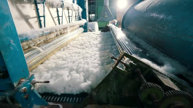Holofiber production. Holofiber. Production of non-woven materials. Holofiber at a nonwovens factory.