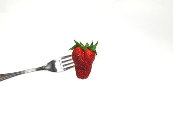 freshly picked large red strawberries in trays-