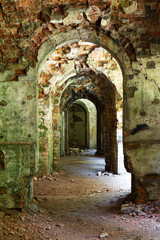 Fototapeta na wymiar Mystical ruins. Old destroyed fort Tarakanivskyy inside, Rivne region. Ukraine