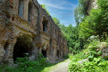 Mystical military ruins in forest. Old destroyed fort Tarakanivskyy outdoor,  Rivne region. Ukraine