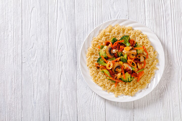 quinoa with fried veggies, mushrooms on plate