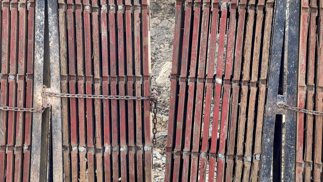 Stack of construction wood planks for home structure building