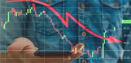 Businessman hand making a decrease chart. Concept of economic downturn. Global financial crisis