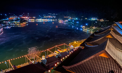 Sunrise with fog over Ban Rak thai, chinese village near a lake in Mae Hong Son, Thailand