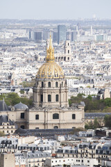 Fototapeta na wymiar Paris, France, Europe: aerial view of the skyline of the city with the Saint Louis cathedral in the Les Invalides complex and the Pantheon seen from the top of the Eiffel Tower 