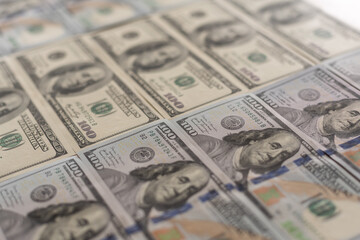 Background from 100 dollar bills. Wealth and success concept.