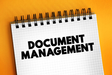 Document Management - system used to capture, track and store electronic documents, word processing files and digital images of paper-based content, text concept on notepad