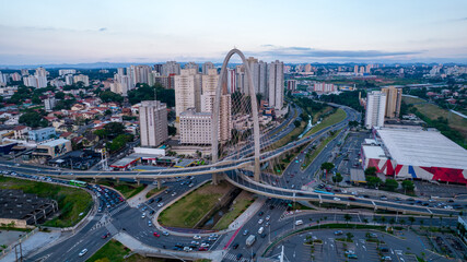 Fototapeta na wymiar Sao Jose dos Campos, Sao Paulo, Brazil - 04, 2022:.Aerial view of the cable-stayed bridge in São José dos Campos known as the innovation arch.