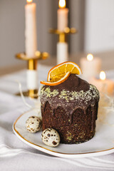 Delicious Easter cakes and eggs on white table with flowers 