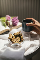 Still life with a Cup of coffee and cookies. The atmosphere of a cozy morning Breakfast at home or in a cafe.