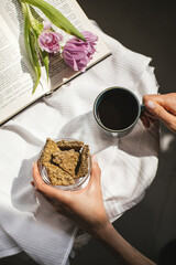 Still life with a Cup of coffee and cookies. The atmosphere of a cozy morning Breakfast at home or in a cafe.