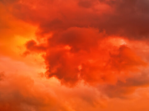 Shift of wind, ragged clouds. Sunset sky colors