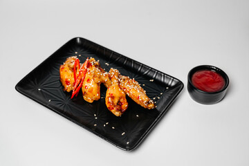 Teriyaki, asian food, Chinese dishes, teriyaki on black plate, microgreen