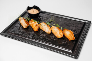 Teriyaki, asian food, Chinese dishes, teriyaki on black plate, microgreen