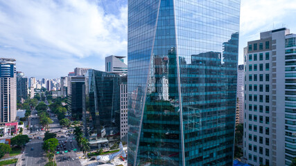 Obraz na płótnie Canvas Aerial view of Avenida Brigadeiro Faria Lima, Itaim Bibi. Iconic commercial buildings in the background. With mirrored glass