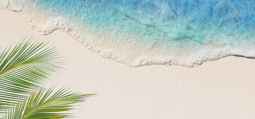 Tropical beach background with sea waves, white sand and foam - summer holiday panoramic top view...