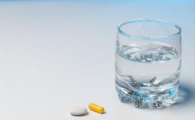 Two tablets and a scan with water