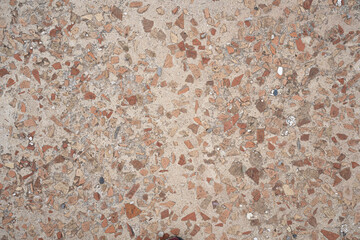 Red stones with concrete paviment