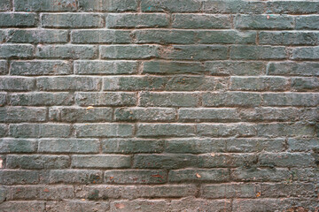 Dirty grey brick wall