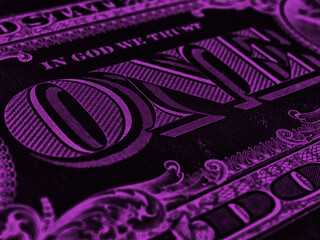 American paper money. 1 US dollar banknote. Word one closeup. Dark purple inverted background or...