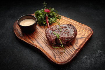 Meat steak on the wooden board