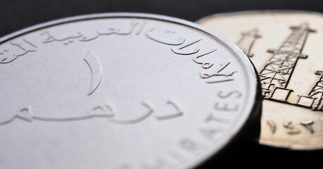 Translation: 1 dirham United Arab Emirates. UAE coins closeup. National currency of  Emirates....