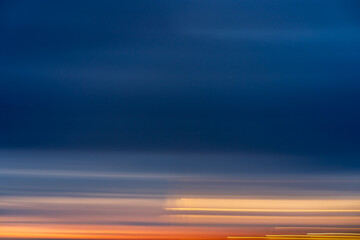seascape abstract with panning motion combined with a long exposure. Image displays soft, bright...