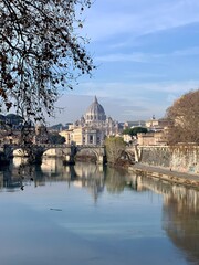 Fototapeta na wymiar Beautiful views of the Vatican City on the banks of the Tiber River on a sunny morning