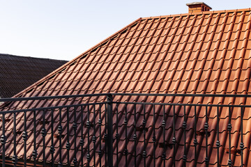 Metal railings and handrails in the loft style. The metal is treated with a primer and anti-corrosion paint. Interior design in industrial style.