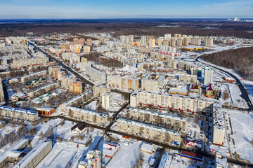 Tobolsk city in winter. Residential area, city development. Aerial view.