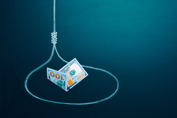 Trapped concept. US 100 dollar bill in a loop as a bait. Investment risk or money trap, business...