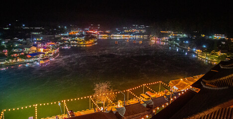 Sunrise with fog over Ban Rak thai, chinese village near a lake in Mae Hong Son, Thailand