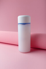 Cosmetics bottle mock up on pink background, blank label, no brand mock up. Cream refiner, shampoo, foam container for face skin care
