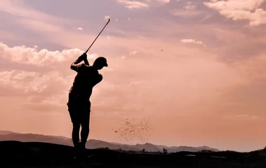 Gordijnen silhouette of a golfer in mid swing © Mel Deck