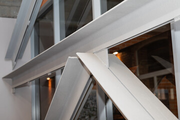 the supporting structure of the building is made of welded metal profile. Industrial style