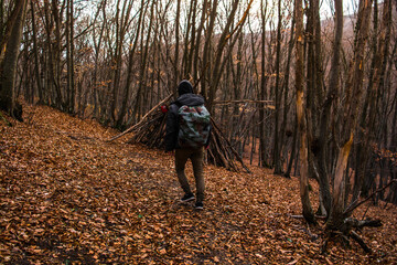 Man in the autumn forest