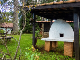 Monte Verde, Minas Gerais, Brasil - April 22 2022: traditional stone housing with wooden window 