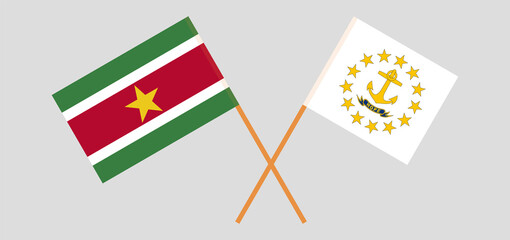 Crossed flags of Suriname and the State of Rhode Island. Official colors. Correct proportion